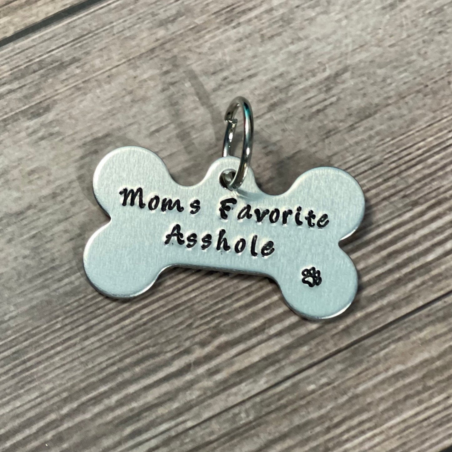 “MOM’S FAVORITE ASSHOLE” Fun Tag