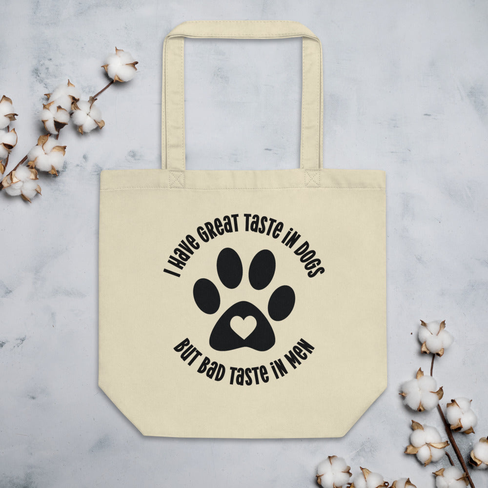 “I HAVE GREAT TASTE IN DOGS, BUT BAD TASTE IN MEN” TOTE BAG